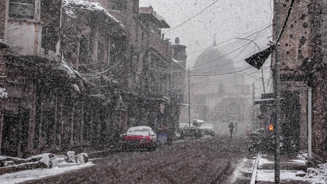Në Foto: Reshjet e rralla të borës gëzojnë irakianët