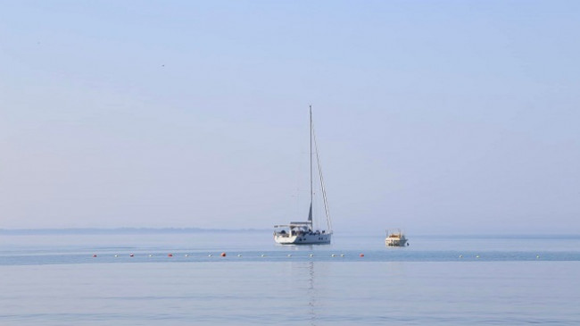 Diell, vranësira e reshje shiu në Shqipëri